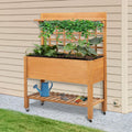 Brown Rolling Wood Planter Bed With Trellis